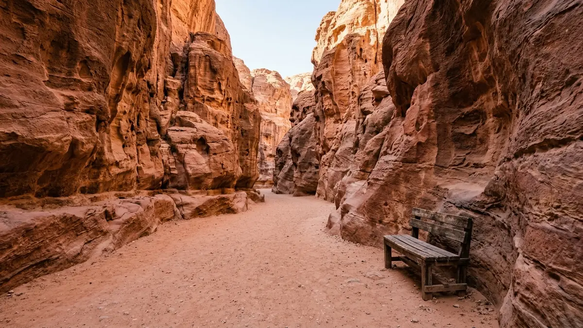 A quiet sandy path between Petra’s sandstone walls